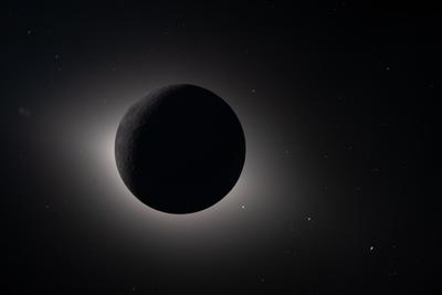 Moon backlit by the Sun with corona